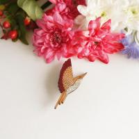 Broche colibri bordeaux